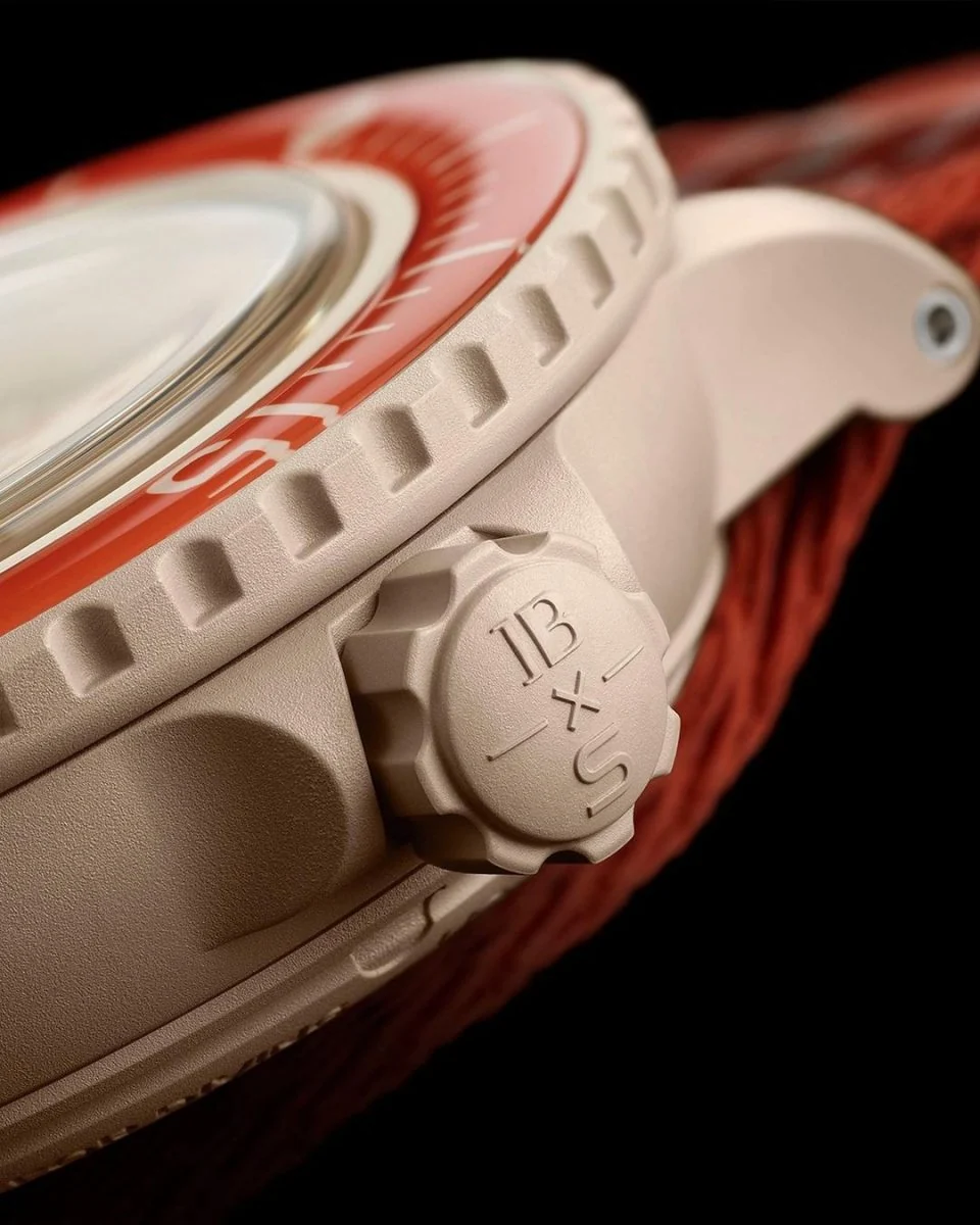 Close-up of a white Blancpain x Swatch watch.