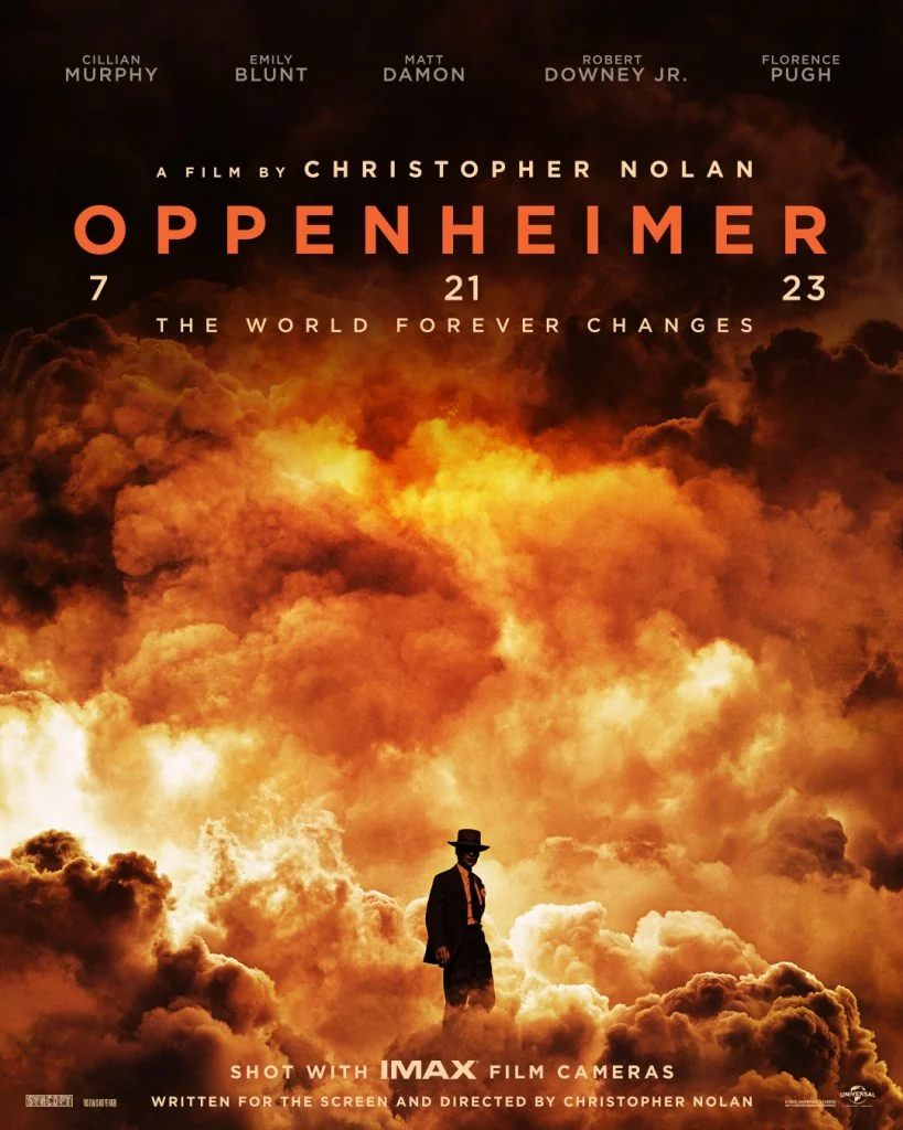 Oppenheimer poster with a figure standing beneath an orange fireball.