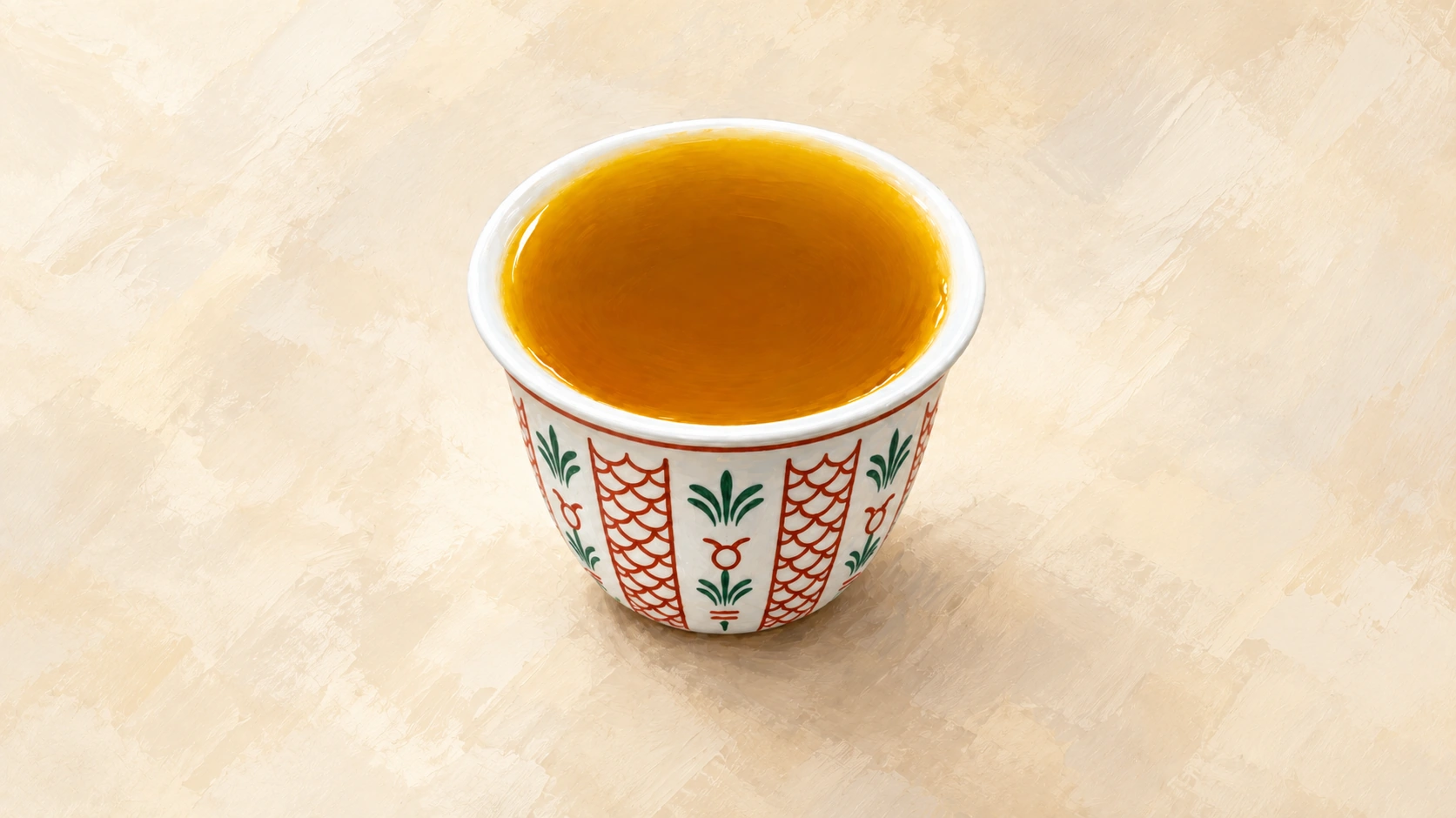 An illustration of an Arabic coffee cup filled to the rim, decorated with red and green patterns on an ivory background.