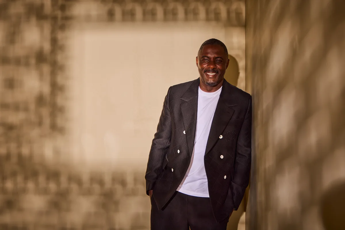 Idris Elba photographed in the Getty Shadows Studio with geometric light across the backdrop.