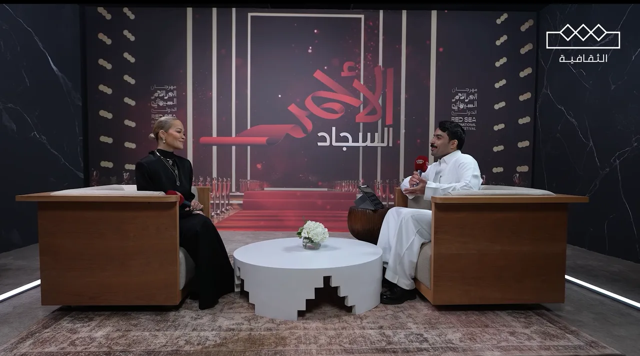 AlThaqafeyah Channel interview set with a host and guest at the Red Sea International Film Festival.