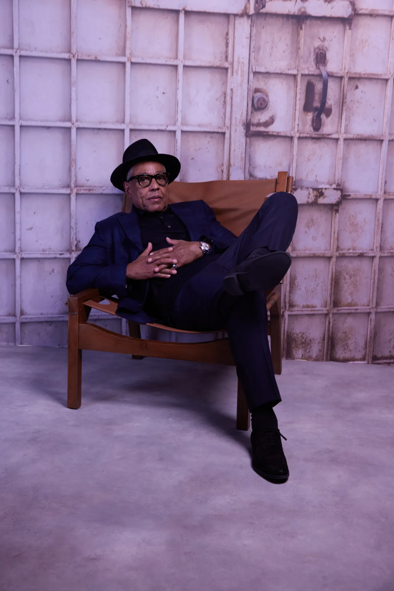 A Deadline Hollywood studio portrait of a guest seated against a Historic Jeddah-inspired set.